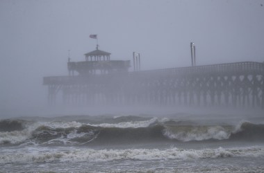 Waves created by Hurricane Florence are seen along Cherry Grove Fishing Pier on September 14th, 2018, in North Myrtle Beach, South Carolina.