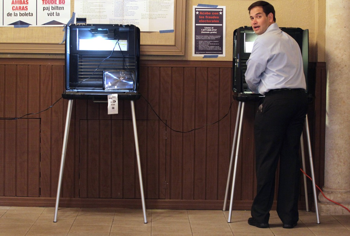 Marco Rubio stands at a voting machine on August 24th, 2010, in Miami, Florida.