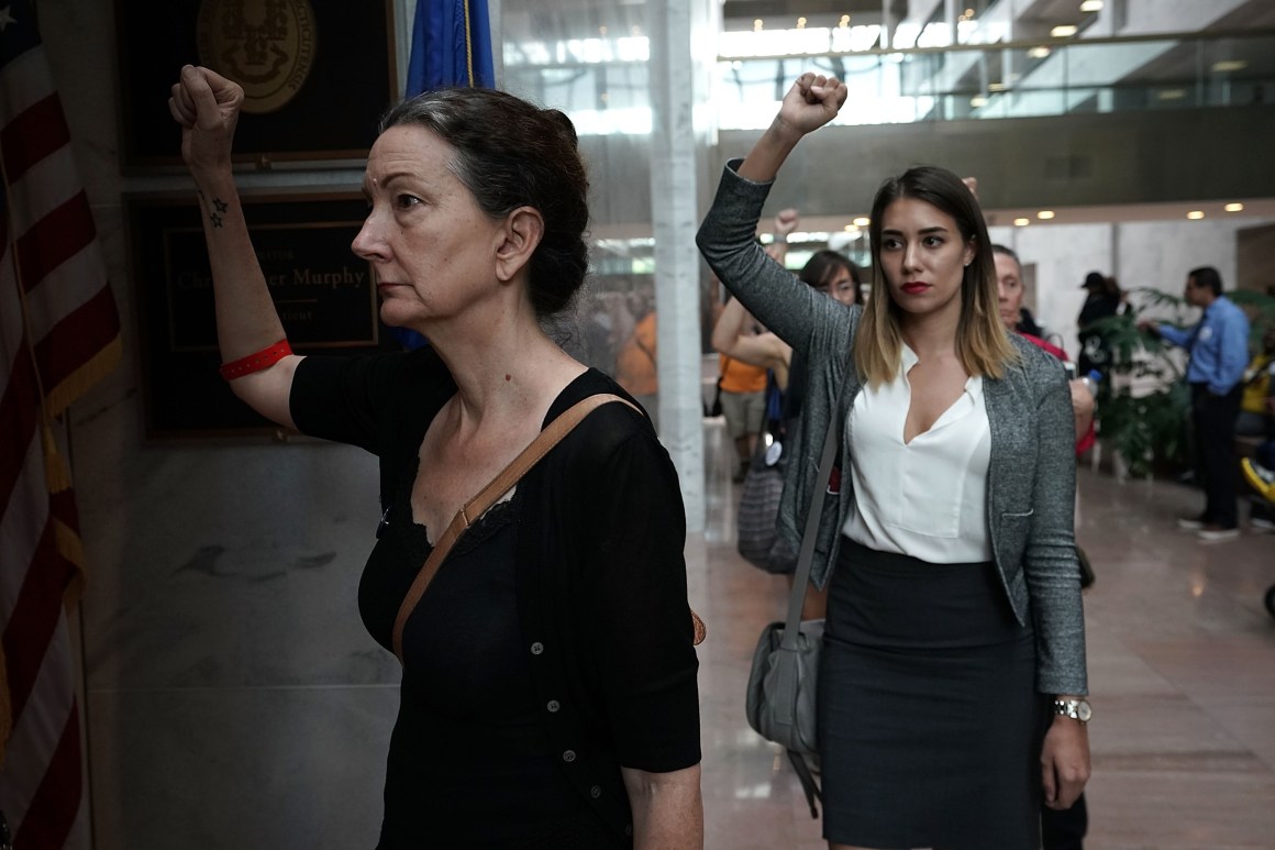 In protest against Supreme Court nominee Judge Brett Kavanaugh, activists chant slogans outside the office of Senate Judiciary Committee Chairman Senator Chuck Grassley (R-Iowa) on September 20th, 2018, at Hart Senate Office Building on Capitol Hill in Washington, D.C.