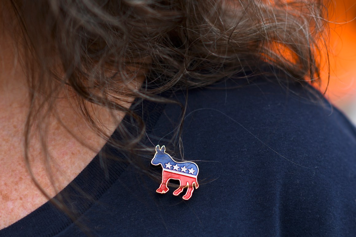 PHILADELPHIA, PA - SEPTEMBER 21: Donna Elms wears a Democrat donkey pin while lining up outside in advance of a campaign rally with former President Barack Obama, Pennsylvania Governor Tom Wolf, and Senator Bob Casey (D- PA) on September 21, 2018 in Philadelphia, Pennsylvania. Midterm election Day is November 6th.