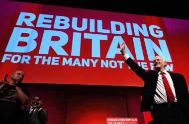 Labour Party leader Jeremy Corbyn acknowledges delegates following his keynote on day four of the Labour Party conference at the Arena and Convention Centre on September 26th, 2018, in Liverpool, England. After months of controversy and allegations of anti-Semitism against Corbyn and the party, he focused on winning issues like green jobs and free childcare in the closing speech.