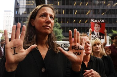 Dozens of protesters against the confirmation of Republican Supreme court nominee Judge Brett Kavanaugh gather outside of Democratic Senator Chuck Schumer's office on September 27th, 2018, in New York, New York.