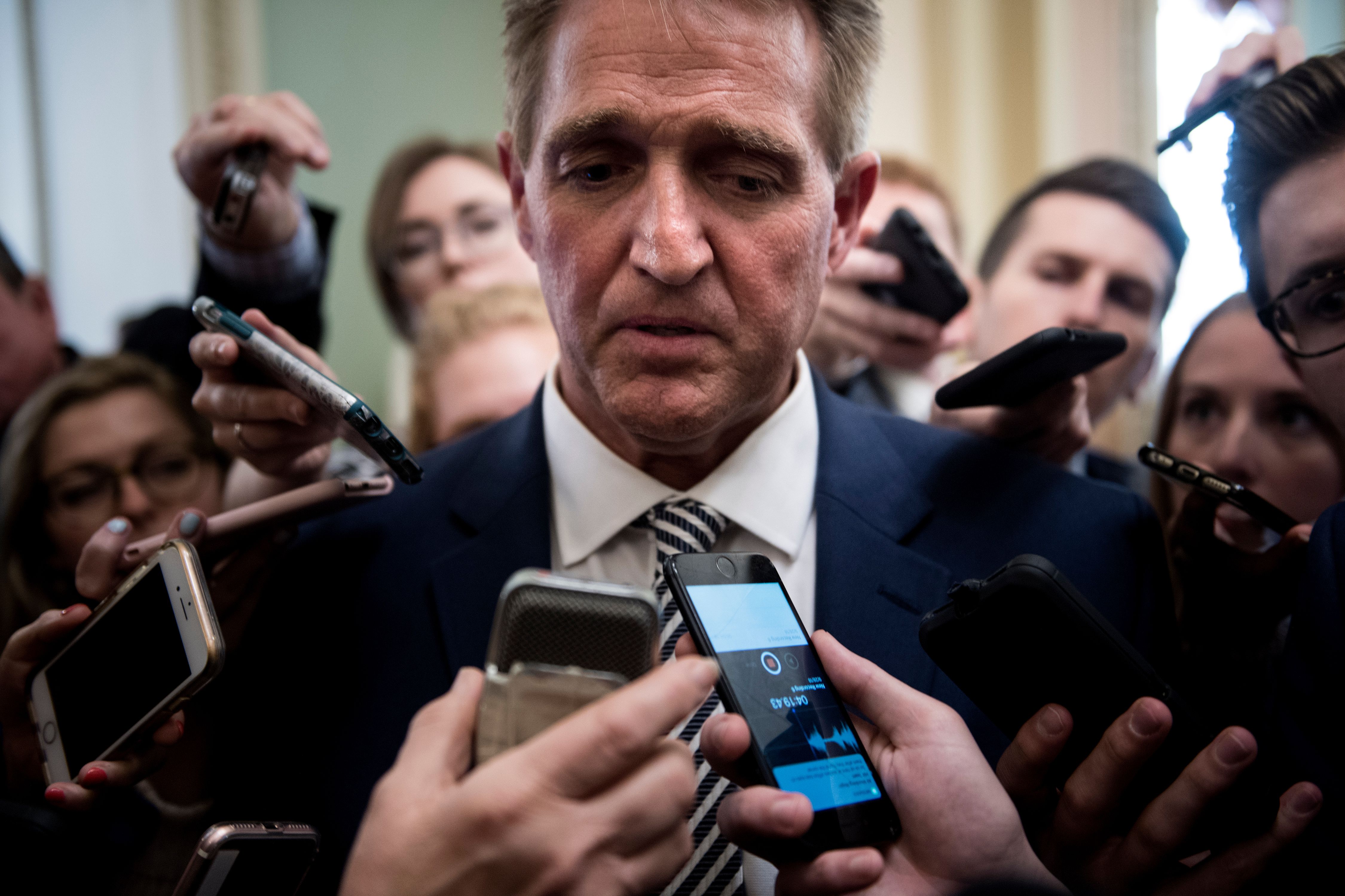 Senator Jeff Flake speaks with reporters after a meeting with Senate Majority Leader Senator Mitch McConnell about the Kavanaugh nomination on September 28th, 2018, in Washington, D.C. Flake initially stated he would vote to confirm Kavanaugh, but called for a delay and an FBI investigation on Friday afternoon.