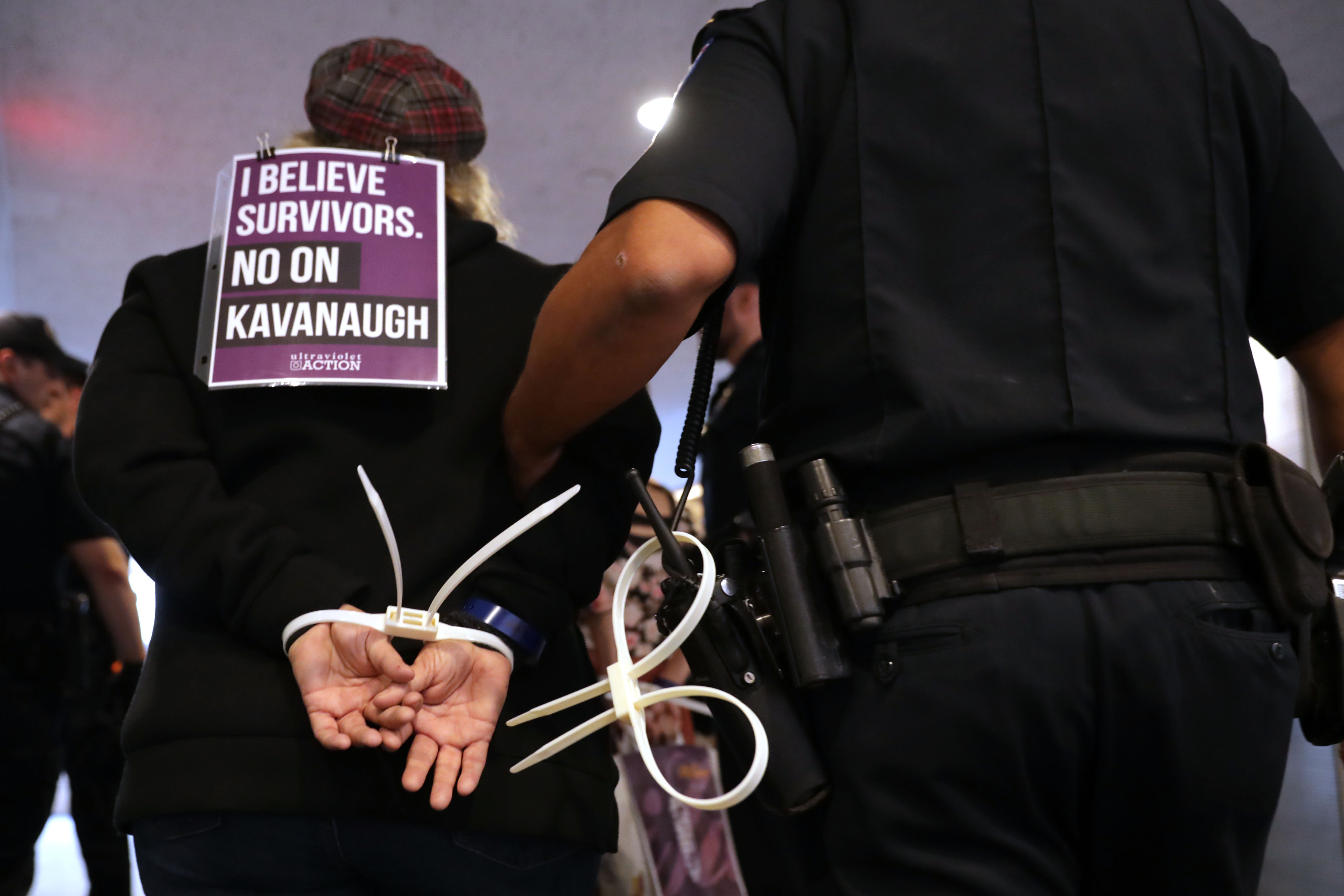 U.S. Capitol Police arrest protesters who were demonstrating against the confirmation of nominee Brett Kavanaugh in the Hart Senate Office Building on September 25th, 2018.