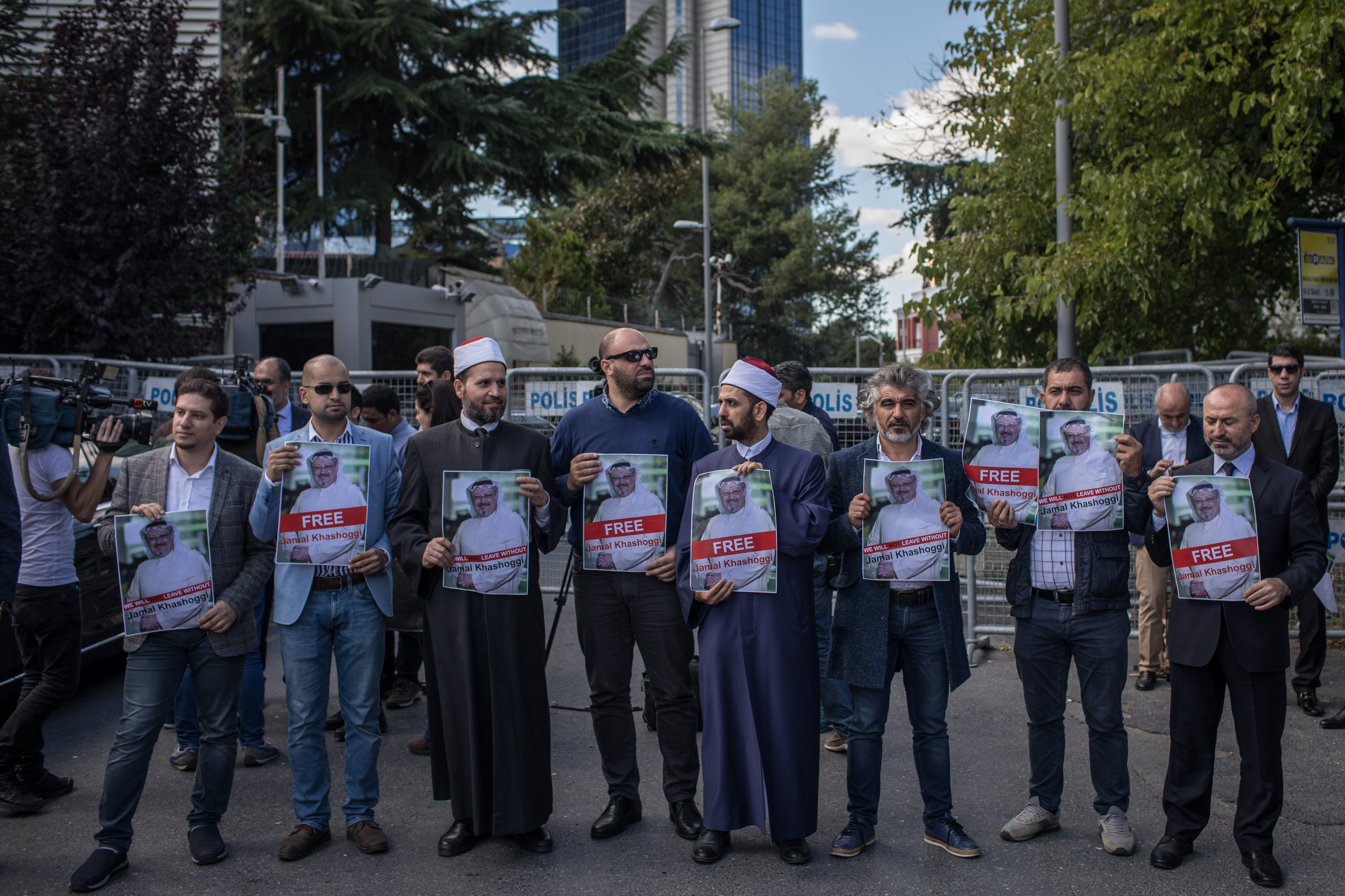 People hold posters of Khashoggi during a protest organized by members of the Turkish-Arabic Media Association at the entrance to the Saudi Arabian consulate on October 5th, 2018, in Istanbul, Turkey.