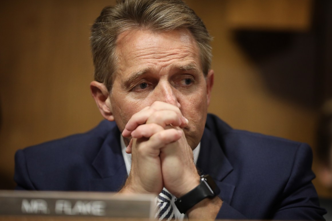 Senator Jeff Flake listens to Democratic senators speak during a Senate Judiciary Committee meeting on September 28th, 2018, in Washington, D.C.