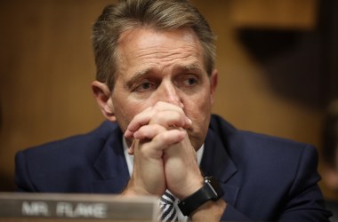 Senator Jeff Flake listens to Democratic senators speak during a Senate Judiciary Committee meeting on September 28th, 2018, in Washington, D.C.