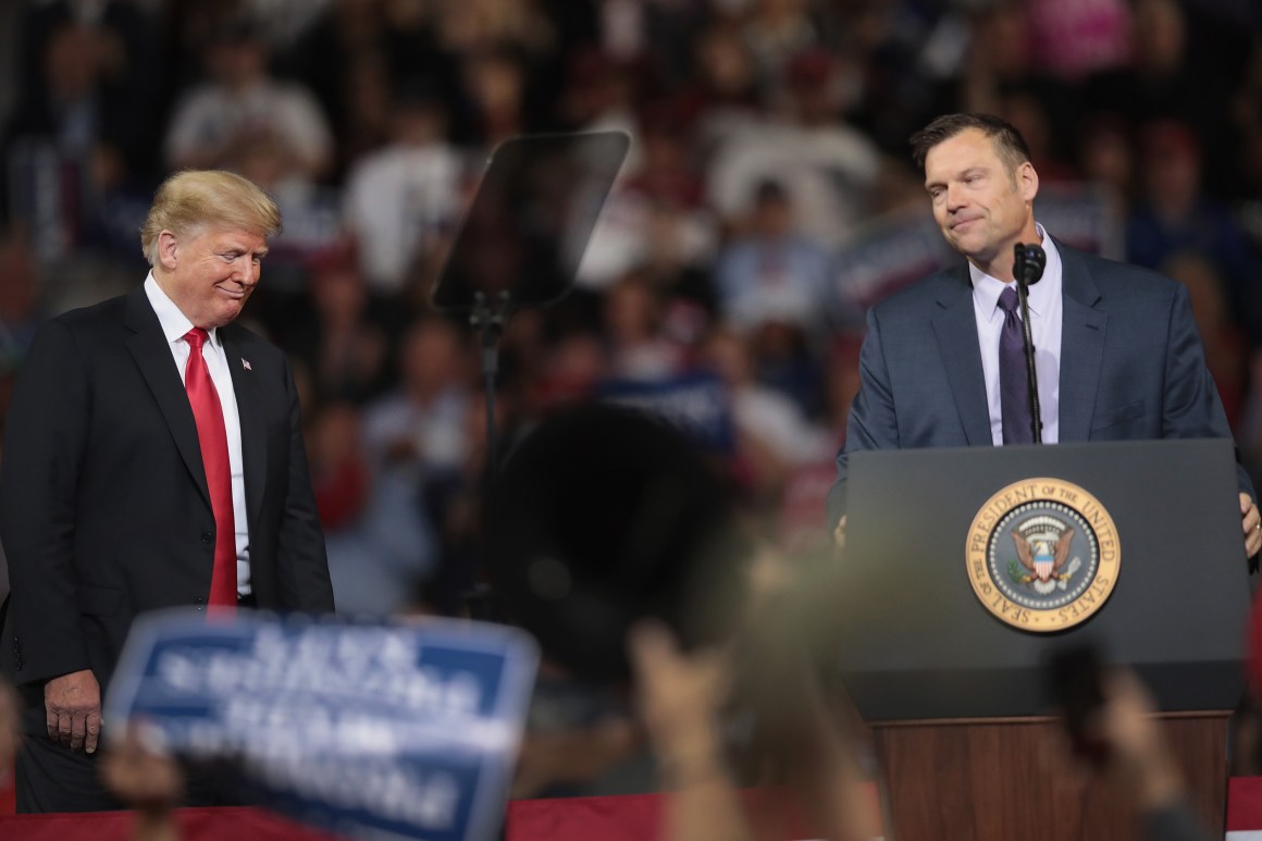 Republican candidate for governor of Kansas Kris Kobach, who lost his race on Tuesday, speaks at a rally with President Donald Trump at the Kansas Expocenter on October 6th, 2018, in Topeka, Kansas.