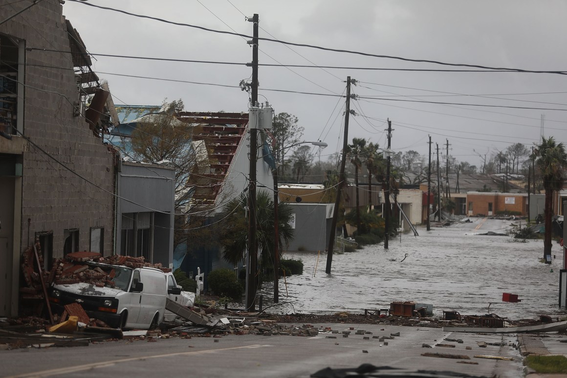 Damaged buildings and a flooded street are seen after Hurricane Michael passed through the downtown area of Panama City, Florida, on October 10th, 2018. The hurricane hit the Florida Panhandle as a Category 4 storm.