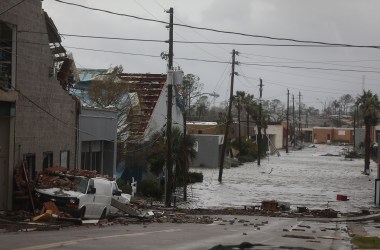 Damaged buildings and a flooded street are seen after Hurricane Michael passed through the downtown area of Panama City, Florida, on October 10th, 2018. The hurricane hit the Florida Panhandle as a Category 4 storm.