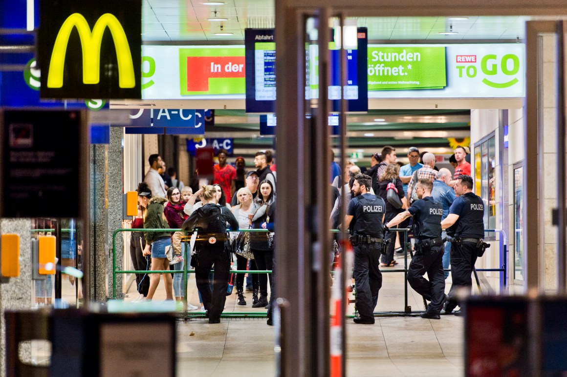 Policemen block an exit in Cologne's main railway station, where a man took a hostage in the early afternoon on October 15th, 2018, at Cologne Central Station in Cologne, Germany. Police sealed off the premises, evacuated the station, and canceled trains. Local media say the incident does not appear to have been terror-related. The woman taken hostage was freed with only minor injuries.