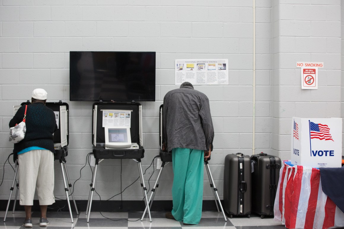 Voters cast ballots during the early voting period at C.T. Martin Natatorium and Recreation Center on October 18th, 2018, in Atlanta, Georgia.