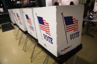 Voting booths are set up at the Yuengling center on the campus of University of South Florida as workers prepare to open the doors to early voters on October 22nd, 2018, in Tampa, Florida.