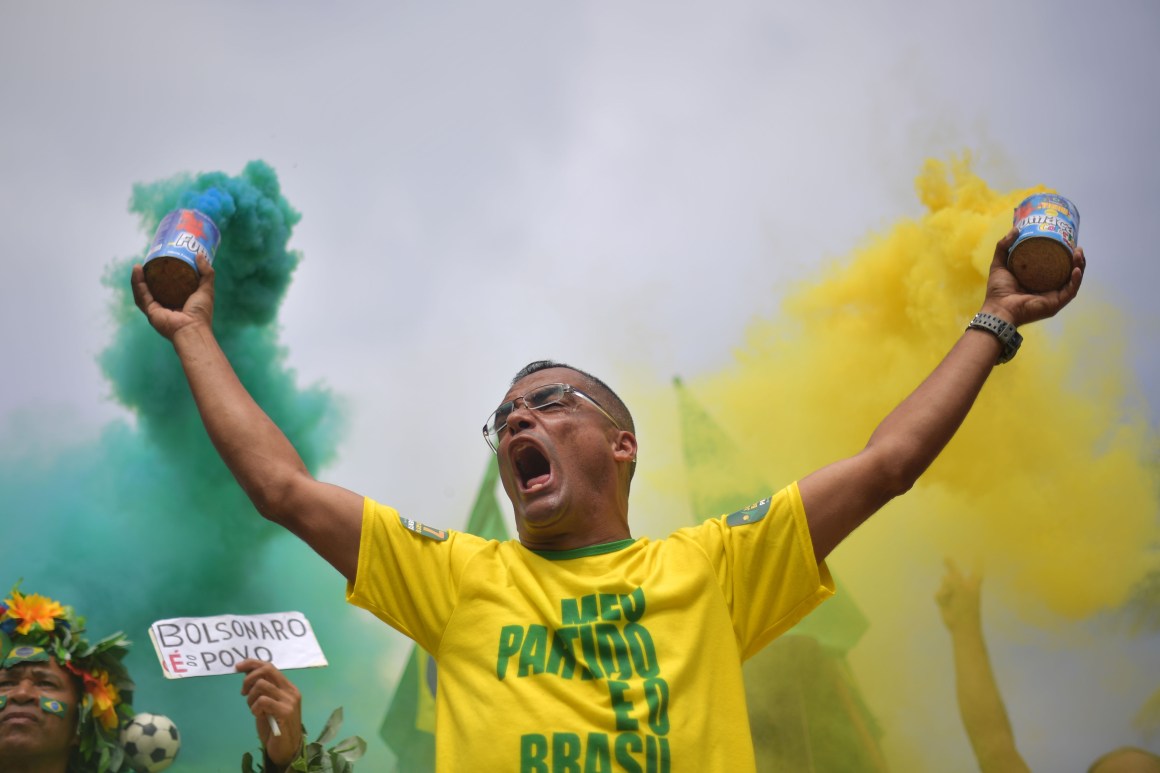 A supporter of far-right lawmaker and presidential candidate for the Social Liberal Party Jair Bolsonaro takes part in a pro-Bolsonaro demonstration in Rio de Janeiro, Brazil, during the second round of the presidential elections on October 28th, 2018.