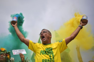 A supporter of far-right lawmaker and presidential candidate for the Social Liberal Party Jair Bolsonaro takes part in a pro-Bolsonaro demonstration in Rio de Janeiro, Brazil, during the second round of the presidential elections on October 28th, 2018.