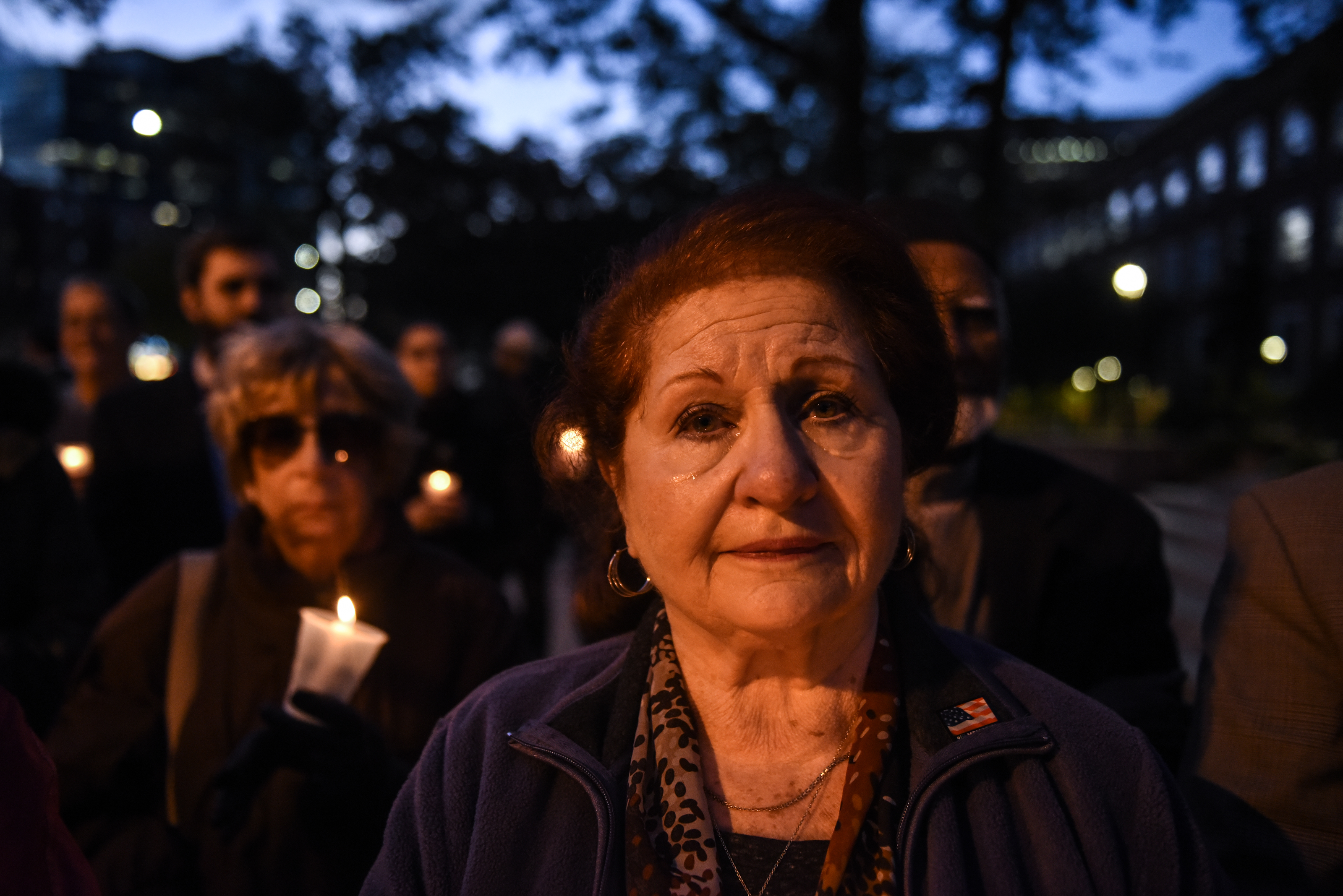 Sarah Goodman, a Queens resident, participates in a candlelight vigil in memory of the victims of the mass shooting at the Tree of Life synagogue on the steps of Queens Borough Hall on October 29th, 2018, in New York City.