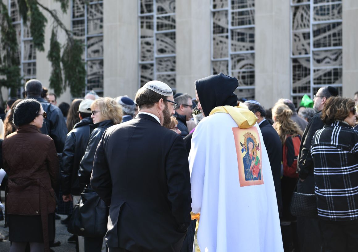 People gather outside the Tree of Life Congregation in Pittsburgh, Pennsylvania, on October 30th, 2018, following the deadliest anti-Semitic attack in recent U.S. history.