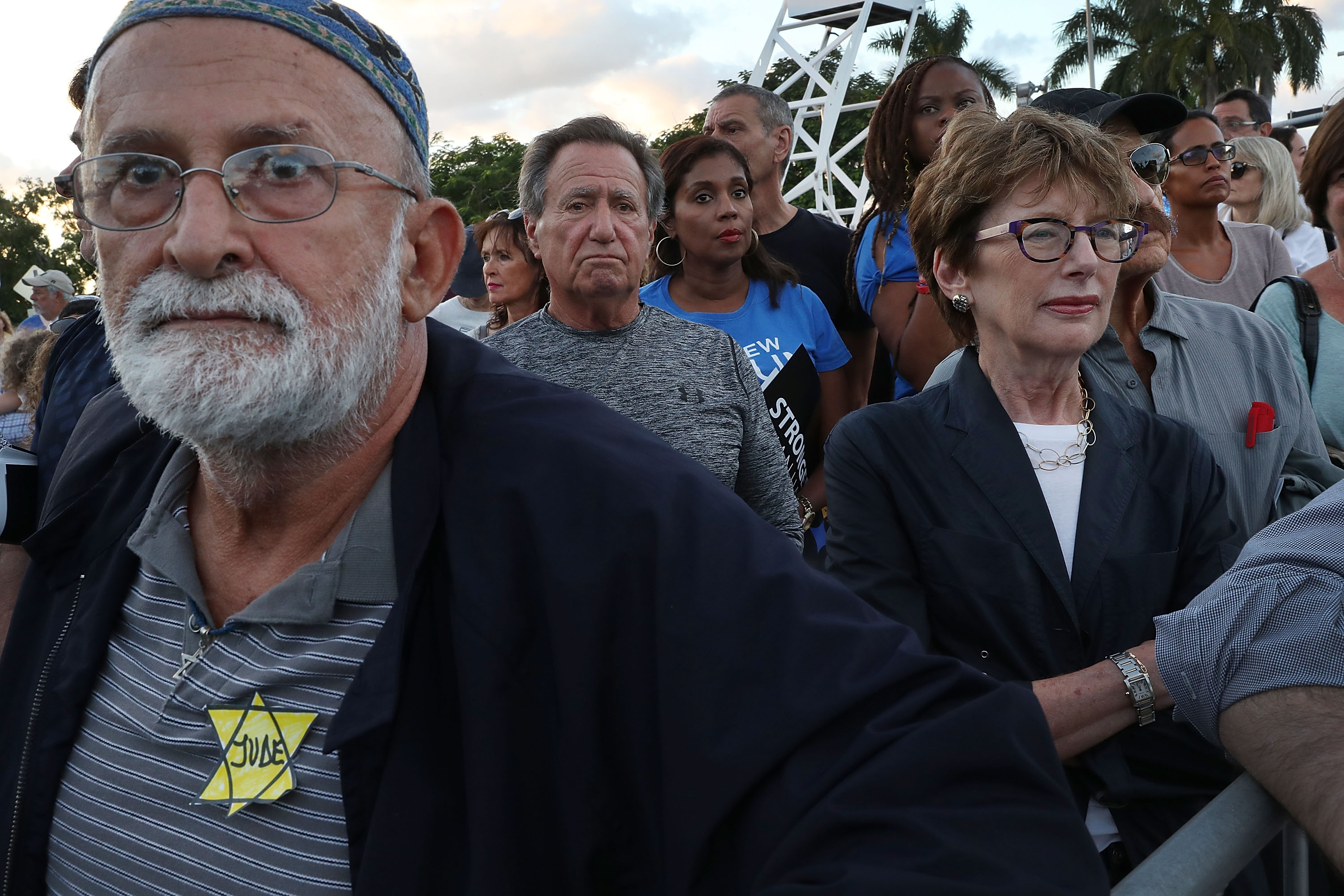 Marco Arias, wearing the symbol Nazis used to identify Jews during the Holocaust, joins with others for a community solidarity vigil at the Holocaust Memorial Miami Beach on October 30th, 2018, in Miami Beach, Florida.