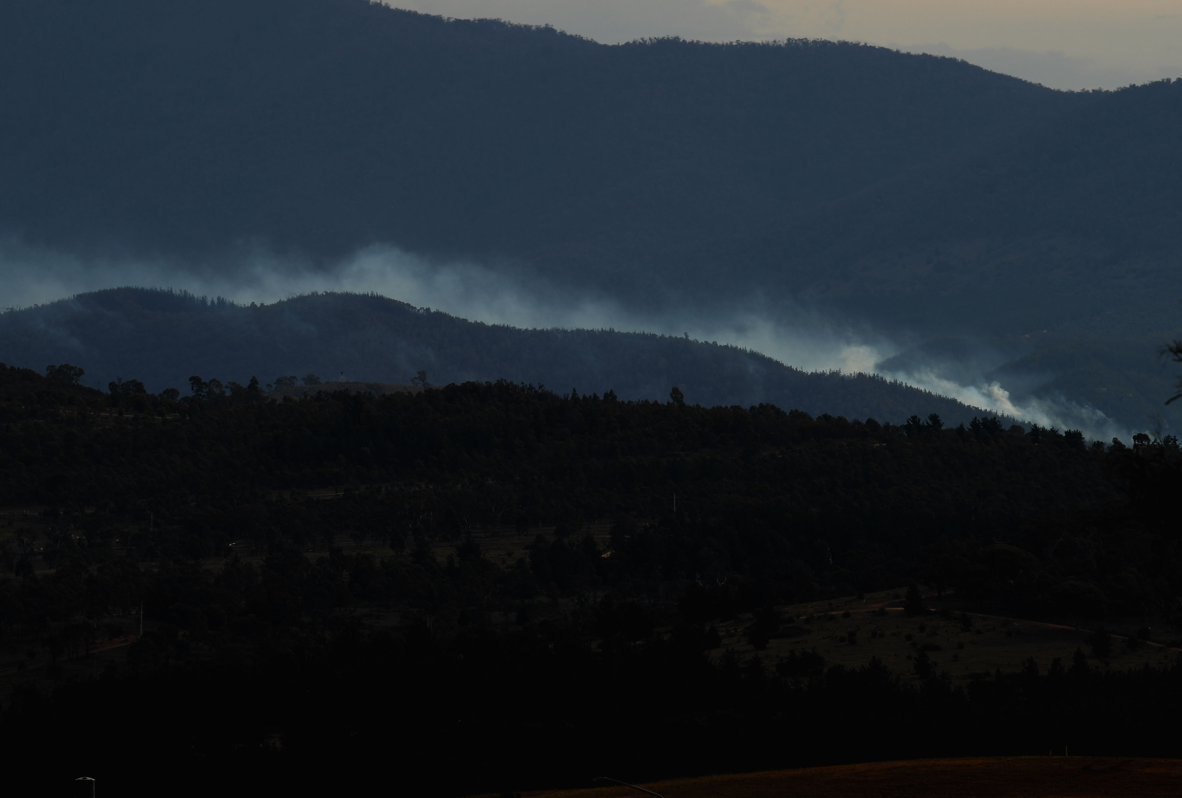 An out-of-control fire to the west of Tuggeranong moves toward Canberra on November 2nd, 2018, in Canberra, Australia.