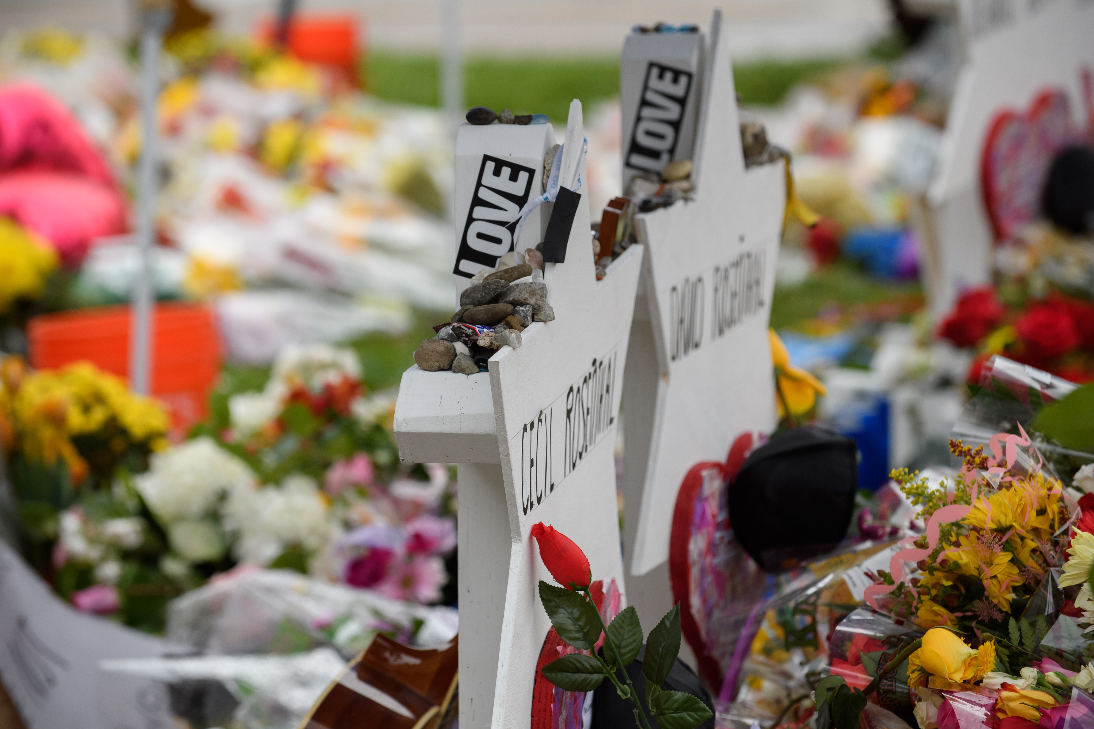 Flowers are laid at a makeshift memorial in front of the Tree of Life Synagogue on November 3rd, 2018, in Pittsburgh, Pennsylvania, following a mass shooting that left 11 of its members dead on October 27th.