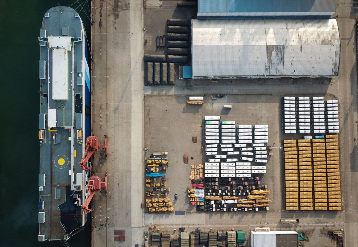 New buses are lined up for export at a port in Lianyungang, in east China's Jiangsu province, on November 4th, 2018. Chinese President Xi Jinping pledged today to widen access to China's economy, a promise delivered amid growing foreign accusations that his government was backtracking on grand reform promises.