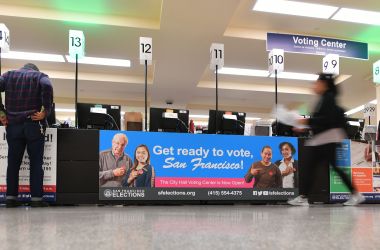 People vote at city hall in San Francisco, California, in the 2018 mid-term election.