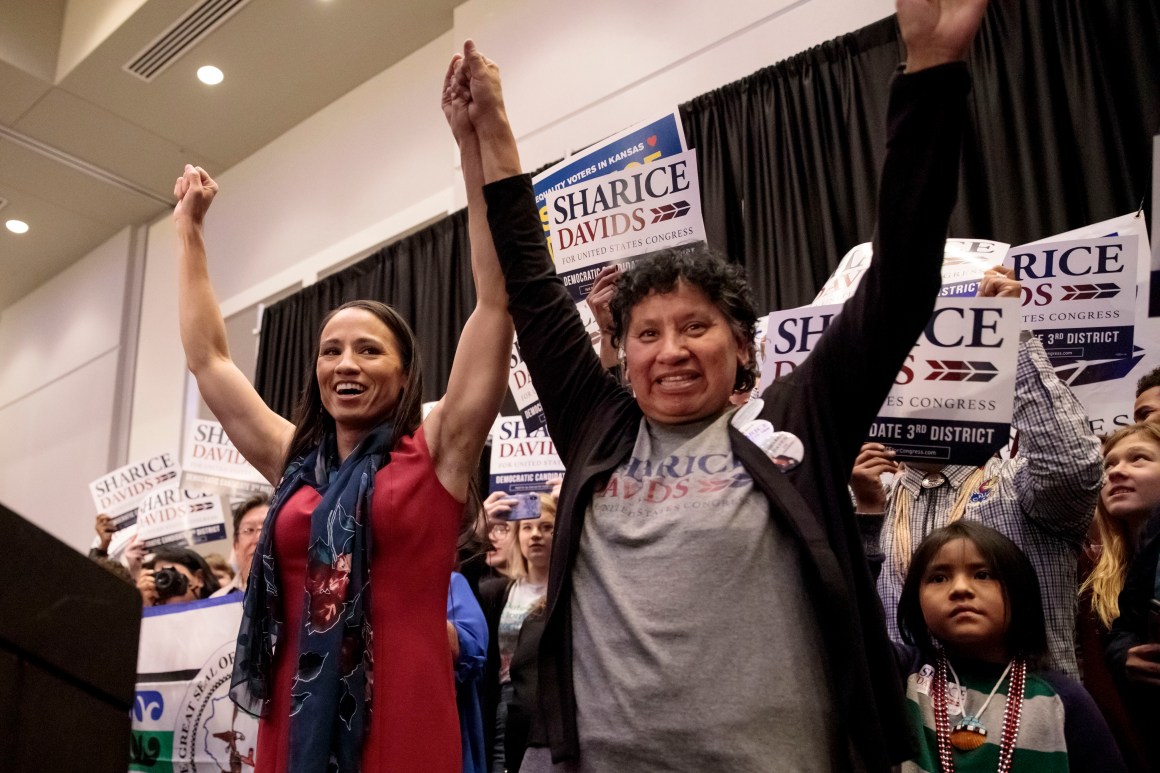 Democratic candidate for Kansas' 3rd Congressional District Sharice Davids (L) and her mother, Crystal Herriage, celebrate with supporters during an election night party on November 6th, 2018, in Olathe, Kansas. Davids defeated incumbent Republican Kevin Yoder. Davids and Deb Haaland (D-New Mexico) will become the first Native American women to serve in Congress.