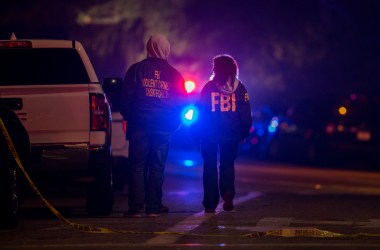 Federal Bureau of Investigation agents monitor the scene near the Borderline Bar & Grill, where a mass shooting occurred, on November 8th, 2018, in Thousand Oaks, California. At least 12 people have died, including a Ventura County Sheriff's Department sergeant. The gunman is also thought to have shot himself.