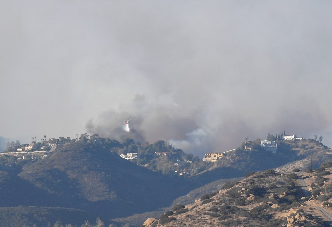 The Woolsey Fire spreads through Porter Ranch, California, on November 9th, 2018.