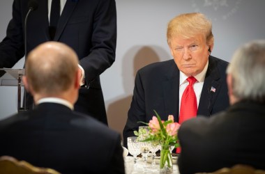 President Donald Trump sits opposite Russian President Vladimir Putin during lunch at the Elysée Palace while commemorating the 100th anniversary of the end of World War I, November 11th, 2018, in Paris, France.