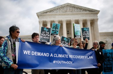 Protesters attend a rally held by the group Our Children's Trust on October 29th, 2018, outside the United States Supreme Court in Washington, D.C. The group rallied in support of the Juliana v. U.S. lawsuit brought on behalf of 21 youth plaintiffs that argues the U.S. government has violated constitutional rights for more than 50 years by contributing to climate change.