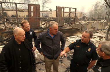 California Governor Jerry Brown, FEMA Administrator Brock Long and Secretary of the Interior Ryan Zinke tour a school burned by the Camp fire on November 14th, 2018, in Paradise, California.