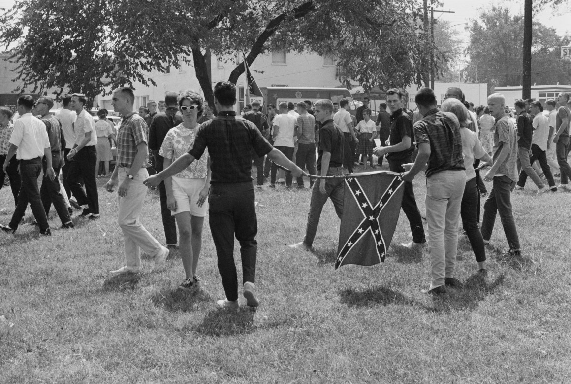 A crowd of students in Birmingham, Alabama, flying the Confederate flag in opposition to the start of the Birmingham Campaign in May of 1963.