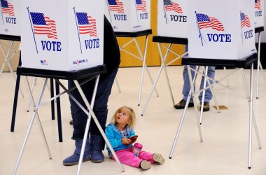 Allyson Webb watches her mother, Angela Webb vote at the Gilpin County Community Center on November 2nd, 2010, outside of Central City, Colorado.