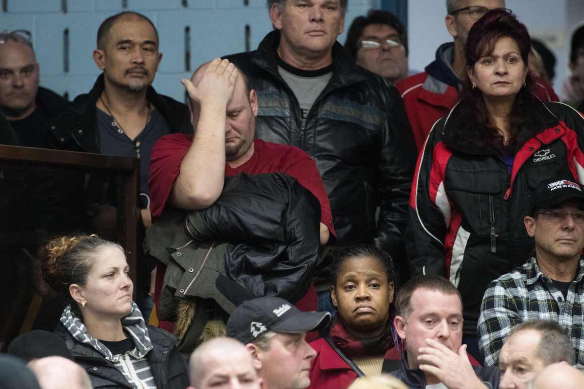 A union member reacts as union leaders speak at Local 222 in Oshawa, Ontario, on November 26th, 2018.