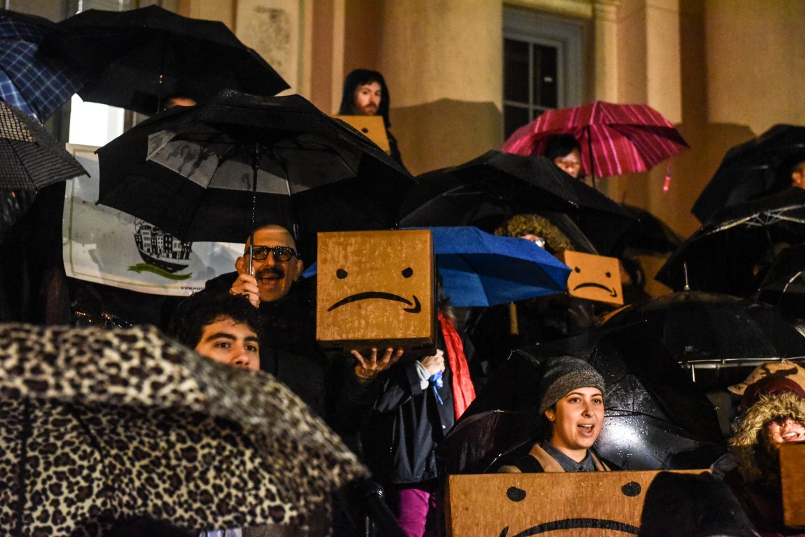 People opposed to Amazon's plan to locate its second North American headquarters in New York City protest at the courthouse in Queens on November 26th, 2018. Amazon recently named the neighborhood of Long Island City in Queens as one of two locations that will house the headquarters, known as HQ2.