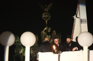 Rabbi Yehuda Teichtal (right) and German President Frank-Walter Steinmeier light Europe's largest menorah during a public lighting ceremony on the first night of Hanukkah, on December 2nd, 2018, in Berlin, Germany.