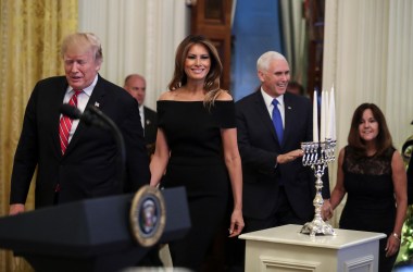 President Donald Trump, Melania Trump, Vice President Mike Pence, and Karen Pence attend a Hanukkah reception in the East Room of the White House on December 6th, 2018, in Washington, D.C.