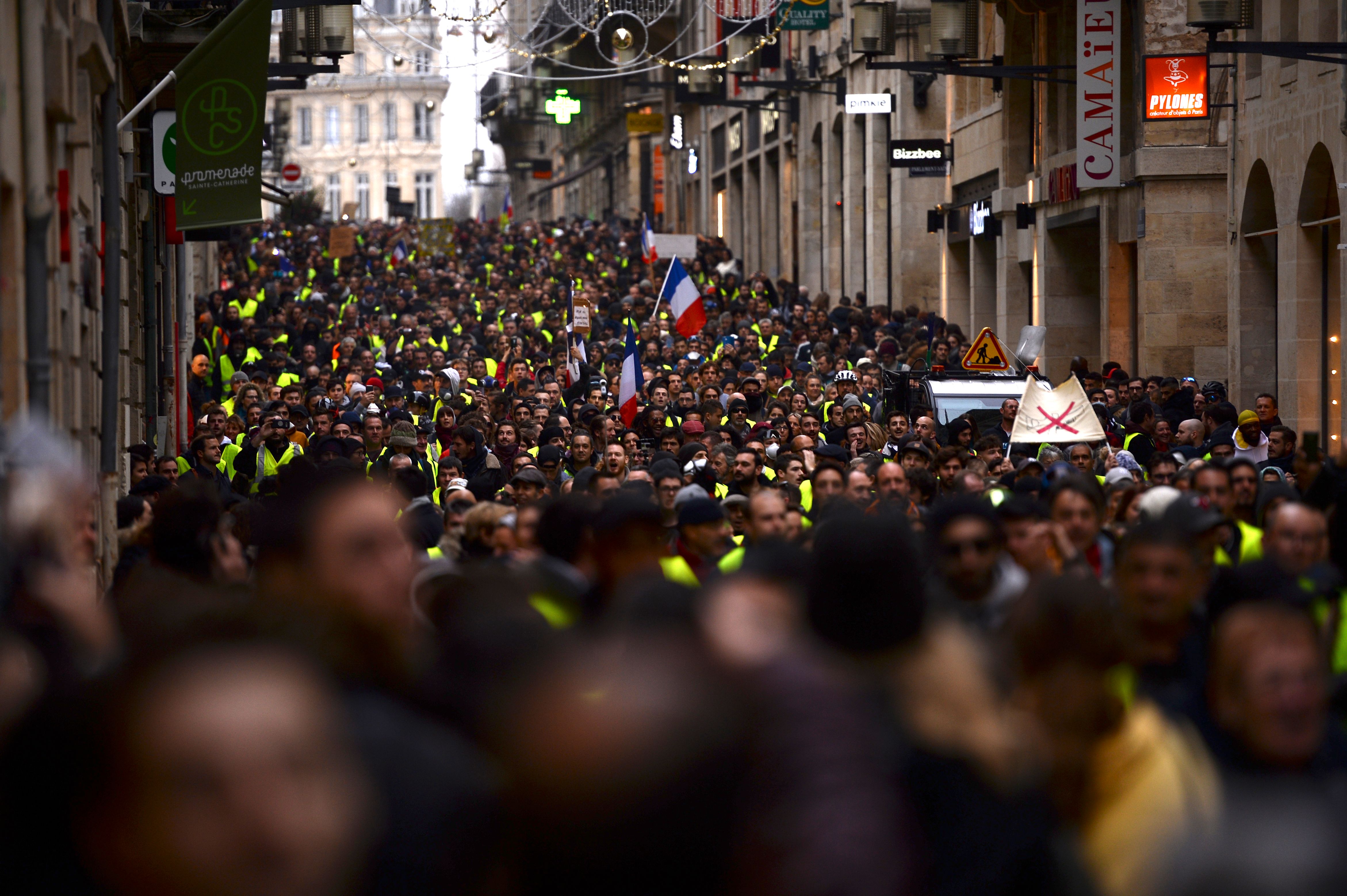 Demonstrators march through the streets of Bordeaux, southwestern France, on December 8th, 2018, to protest income inequality. The 