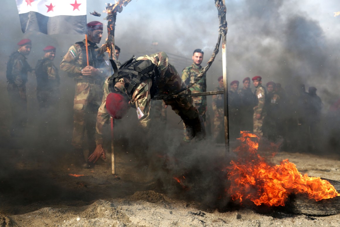 Turkish-backed Syrian fighters train in a camp in the Aleppo countryside of northern Syria on December 16th, 2018. Turkish President Recep Tayyip Erdogan and President Donald Trump agreed Friday to "more effective coordination" between their countries' operations in Syria.