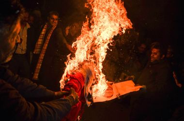 Indian Hindu activists burn an effigy of Chief Minister of Kerala Pinarayi Vijayan during a demonstration in the southern state of Kerala, in New Delhi, on January 3rd, 2019. Clashes broke out in southern India for a second day on January 3rd as Hindu hardliners went on a rampage, seeking to enforce a general shutdown in protest over two women entering Sabarimala Ayyapa, one of the country's holiest temples. The women were the first to enter the temple since a historic ban was lifted. A day after violence—both among rival groups and with police—left one man dead and 15 people injured; authorities said that 266 protesters had been arrested across the state of Kerala.