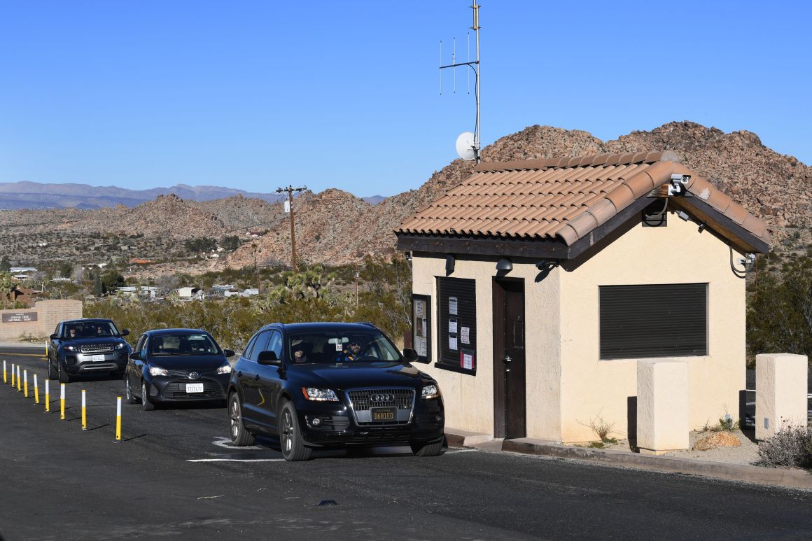 Tourists drive past the closed entrance ticket station of the Joshua Tree National Park after the federal government's partial shutdown caused park rangers to stay home and campgrounds to be shut, at the park in California, on January 3rd, 2019.