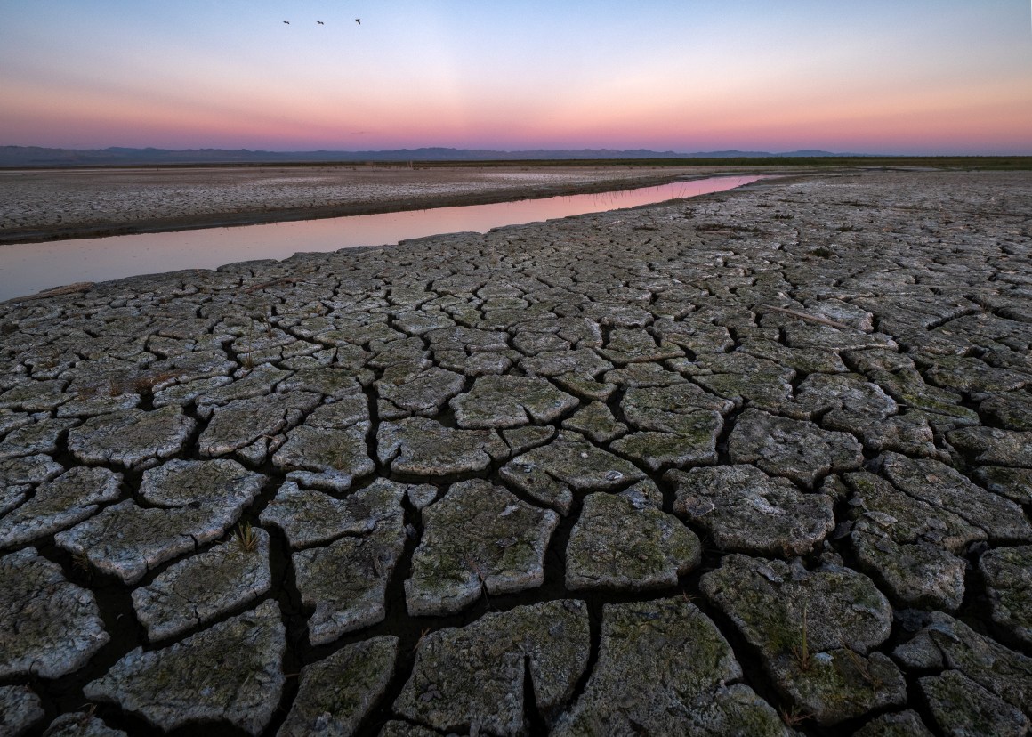 Mud is seen on land that was under the Salton Sea a few years ago on January 1st, 2019, near Calipatria, California.