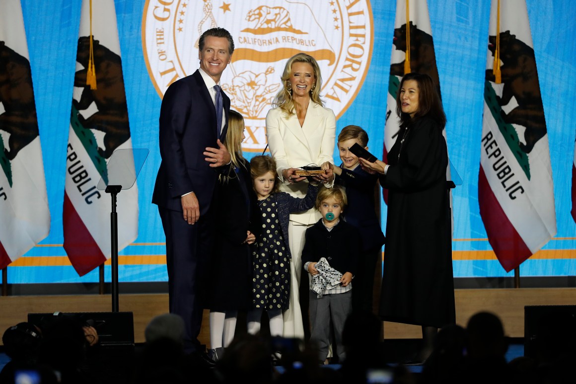 Gavin Newsom is sworn in as governor of California by California Chief Justice Tani Gorre Cantil-Sakauye as Newsom's wife, Jennifer Siebel Newsom, watches on January 7th, 2019, in Sacramento, California.