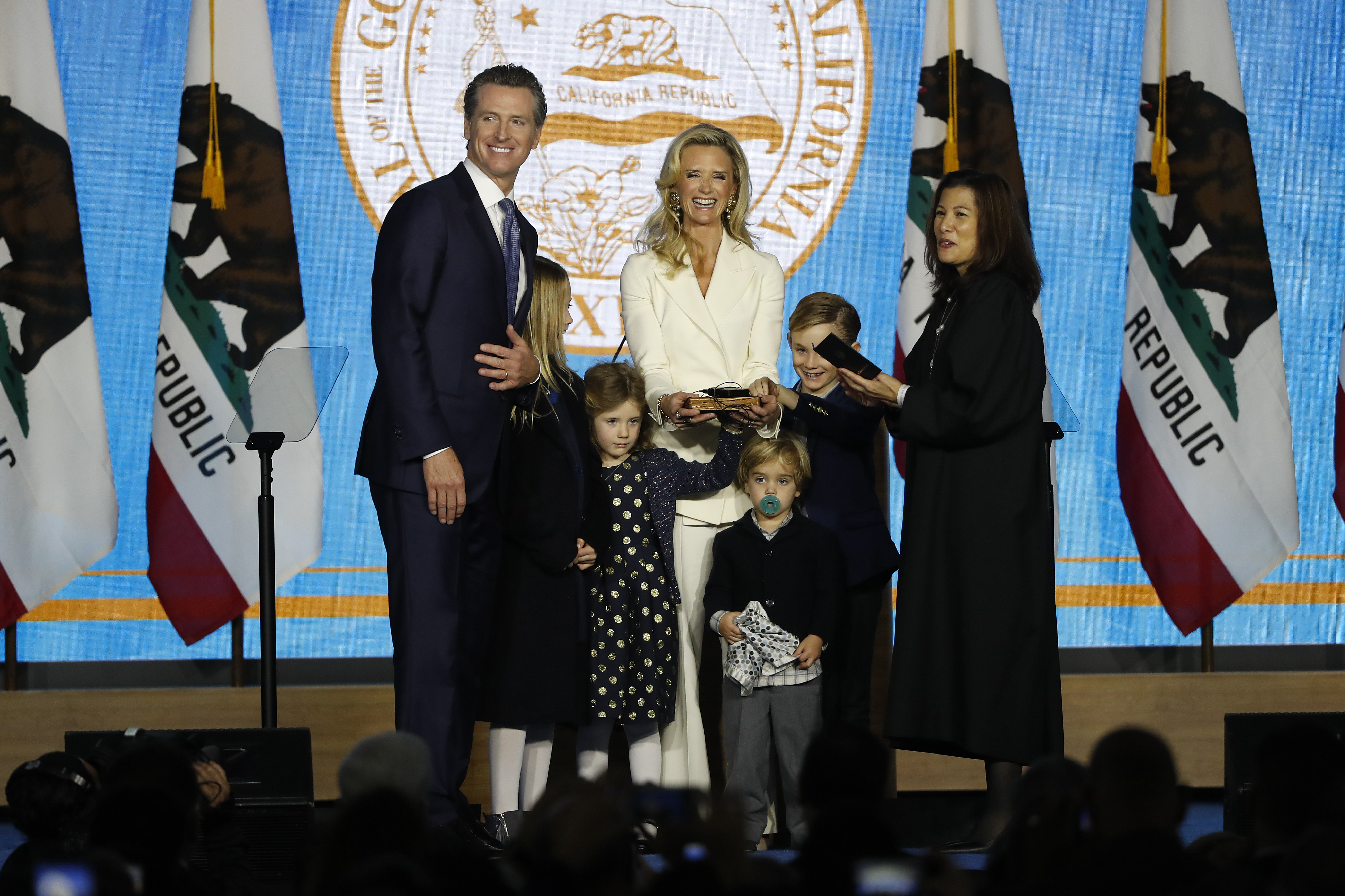 Gavin Newsom is sworn in as governor of California by California Chief Justice Tani Gorre Cantil-Sakauye as Newsom's wife, Jennifer Siebel Newsom, watches on January 7th, 2019, in Sacramento, California.