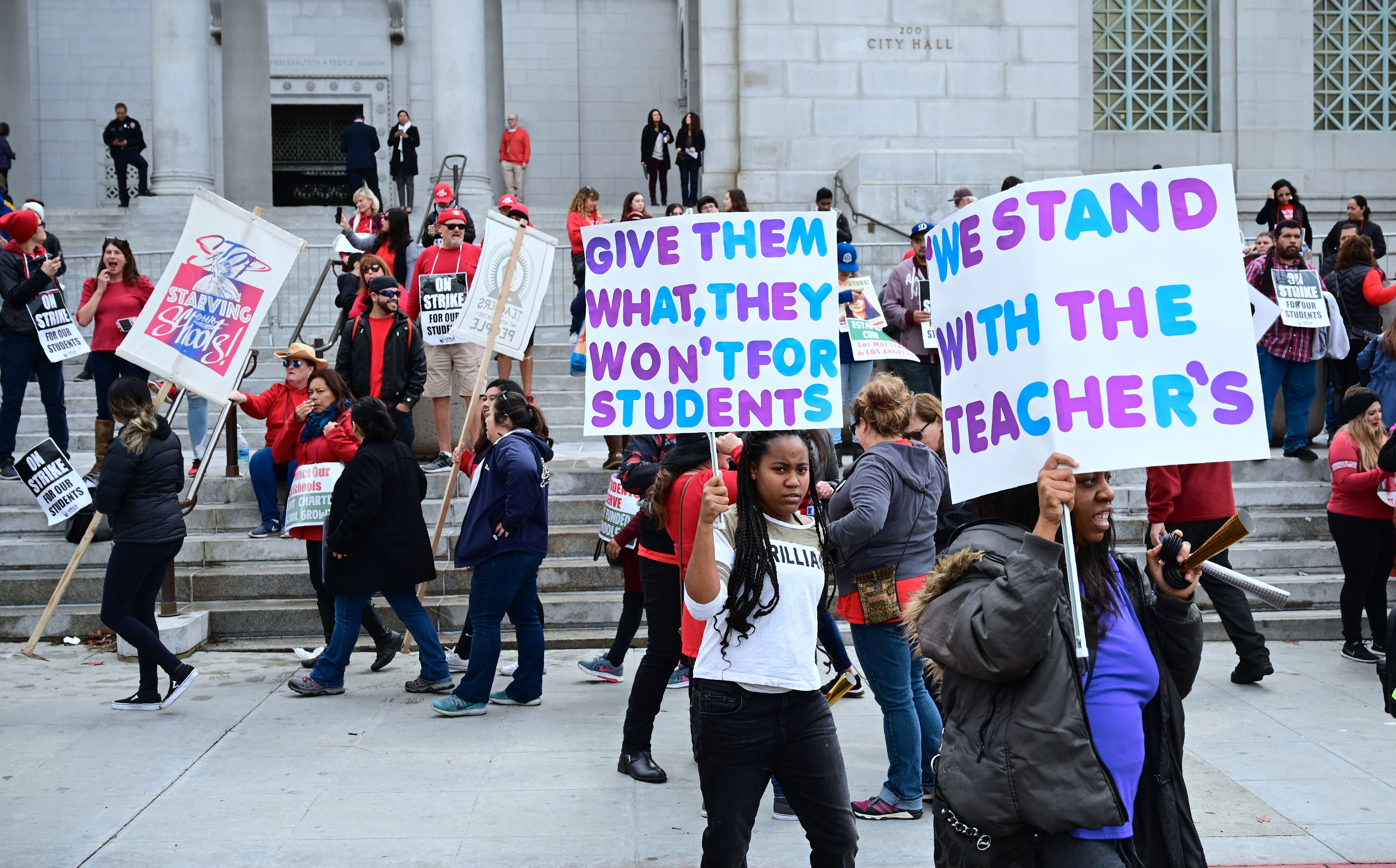 Striking teachers and supporters rally outside City Hall as negotiations resume on Friday, January 18th, 2019, in Los Angeles, California.