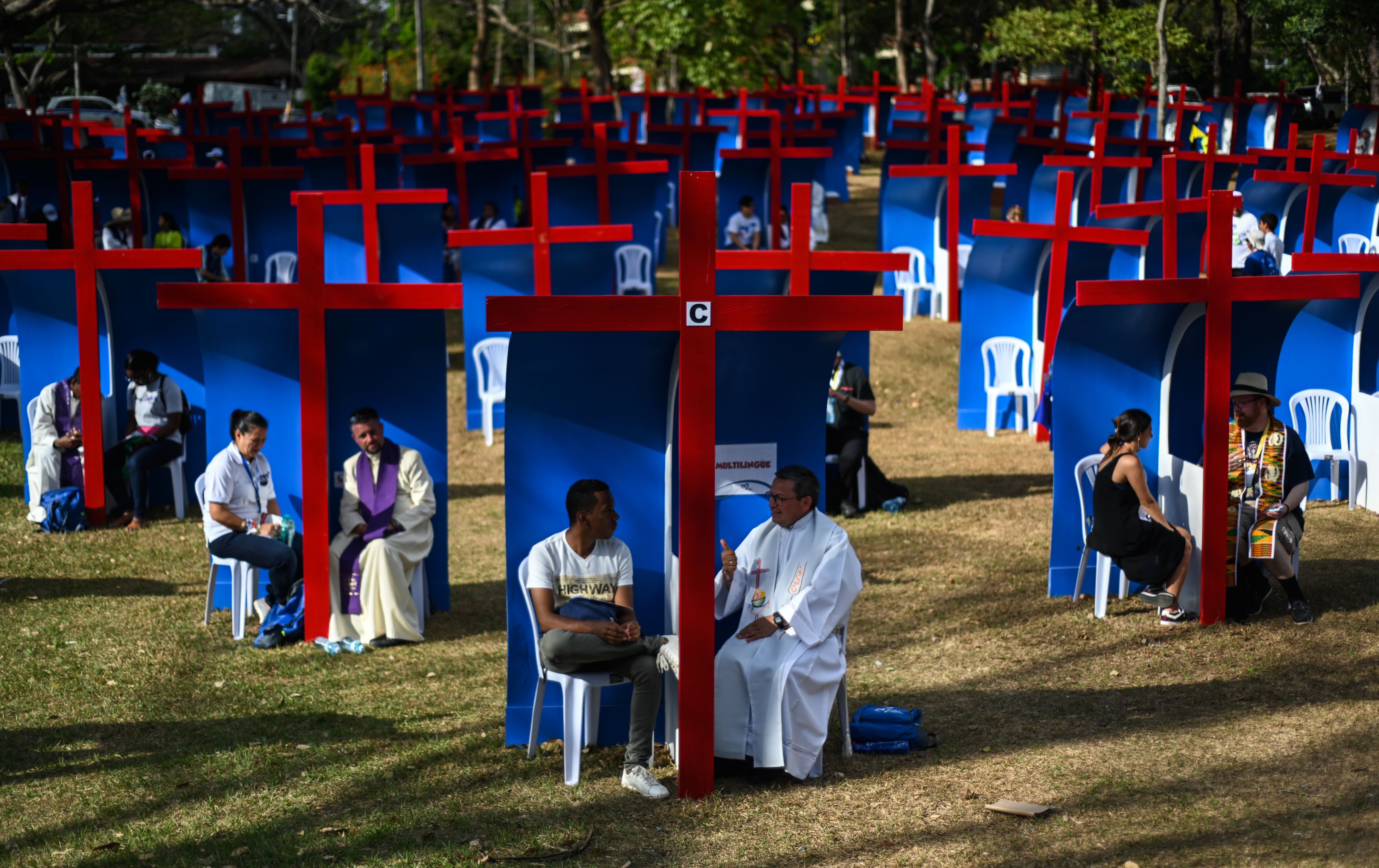 Pilgrims confess at the Youth Park in Panama City on the eve of the arrival of Pope Francis for World Youth Day, on January 22nd, 2019.