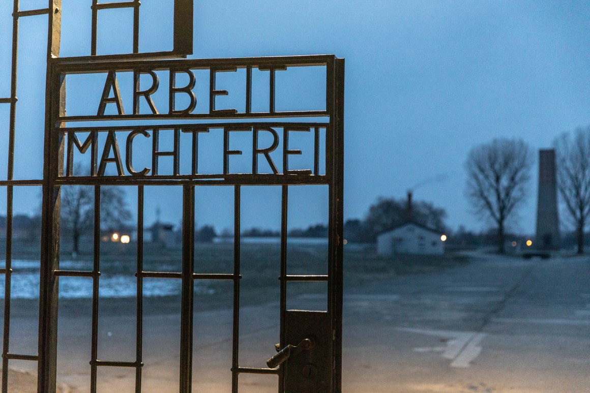 A gate with the inscription "Work Sets You Free" at the Sachsenhausen concentration camp memorial on January 25th, 2019, in Oranienburg, Germany. Starting in 1936, the Sachsenhausen facility was used by the Nazis, initially for political prisoners, then later also for Jews and other religious minorities, homosexuals, and Soviet prisoners of war.