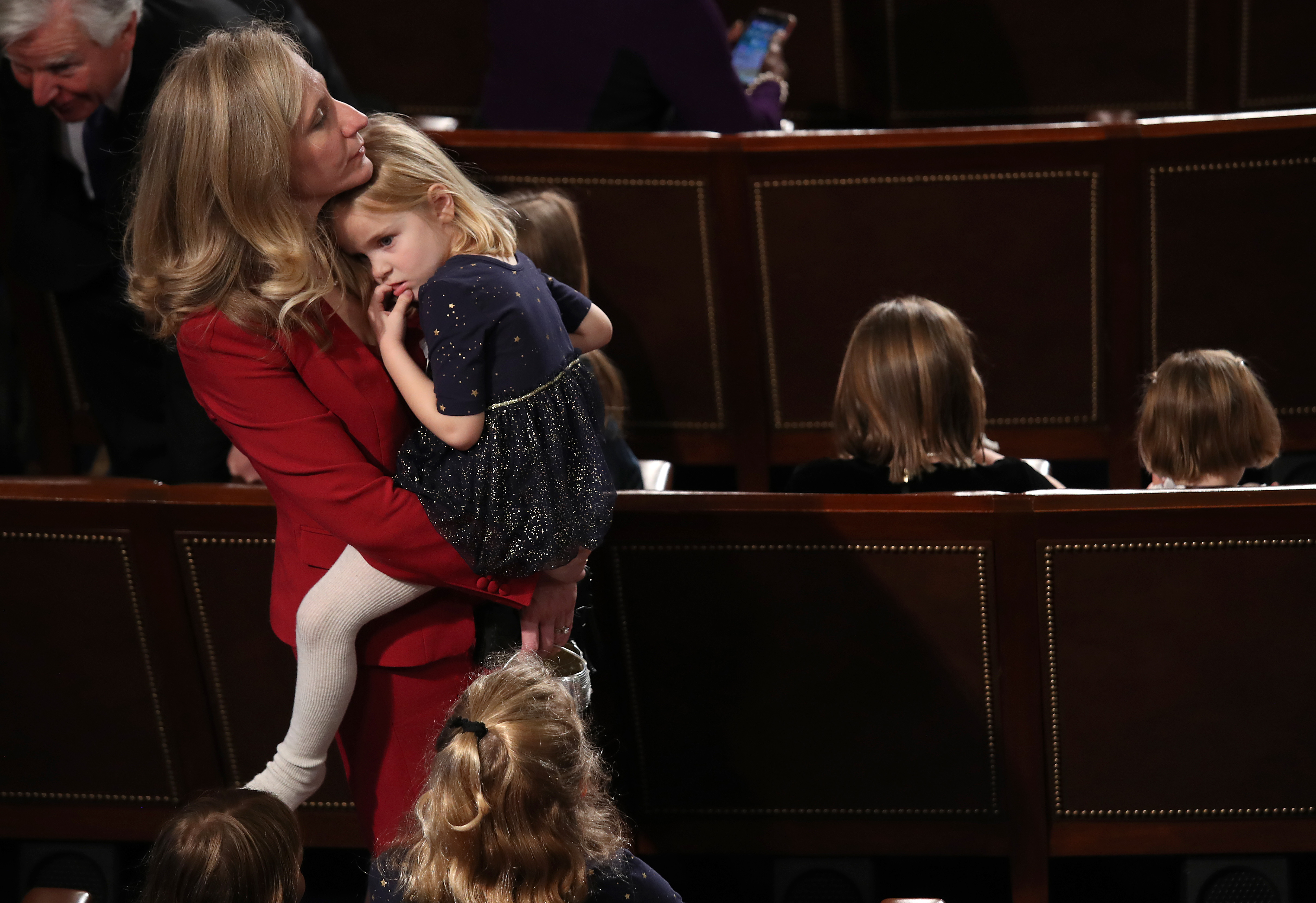 Representative Abigail Spanberger (D-Virginia) holds her daughter Catherine before being sworn in as a new member of the House on January 3rd, 2019.