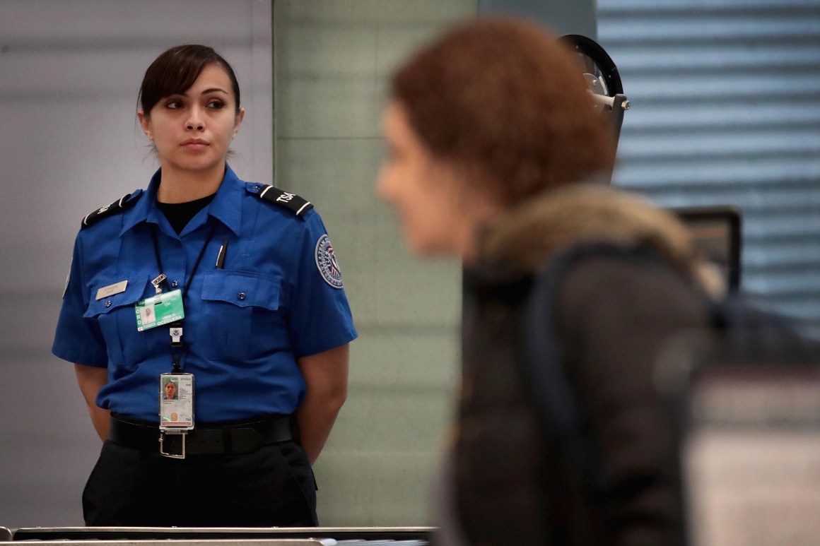 A Transportation Security Administration worker screens passengers at O'Hare International Airport on January 7th, 2019, in Chicago, Illinois.